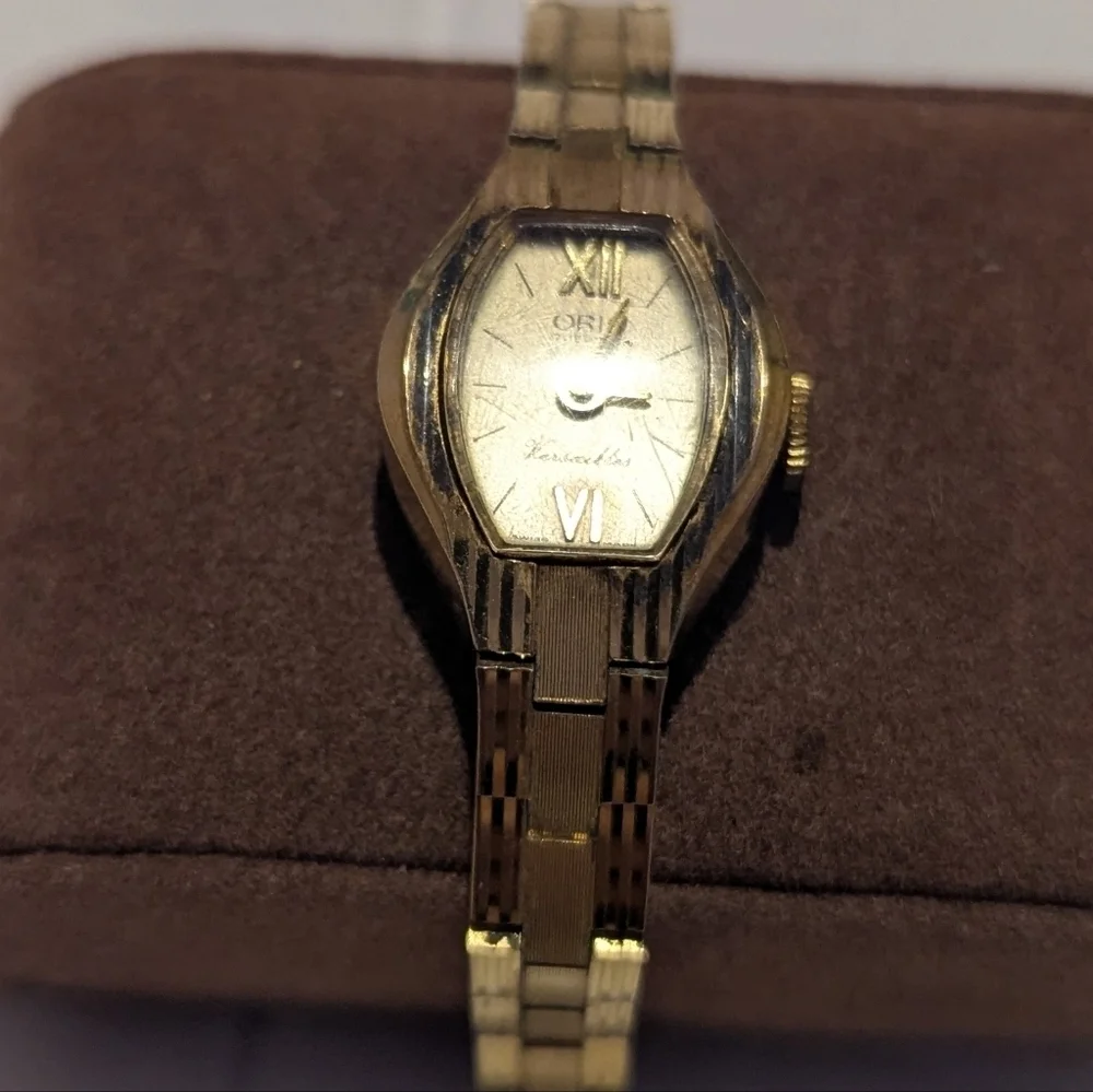 Oris Gold Timepiece with Ivory Dial